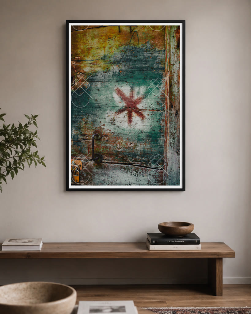 Weathered teal door texture print framed and hung above a console table